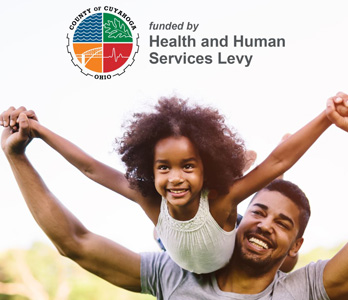 Child on fathers back smiling